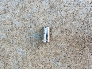 An 8mm 1/4-inch drive Craftsman socket with light scratches and a few small rust spots.